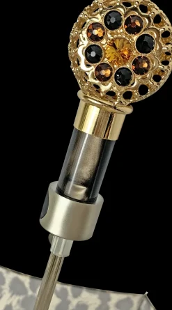 Elegant leopard design with filigree handle