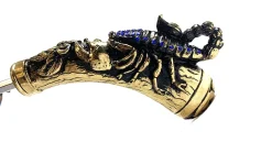 Exclusive handle with 24K golden scorpion and embellished with sapphir
