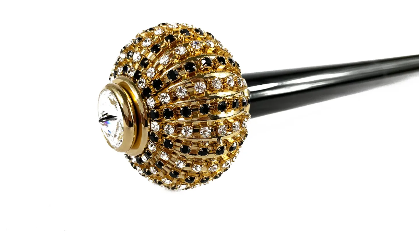 Walking stick with brass onion with black and white crystals